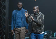 This image released by Warner Bros. Entertainment shows LeBron James, left, with director Malcolm D. Lee on the set of "Space Jam: A New Legacy," in theater and on HBO Max on July 16. (Justin Lubin/Warner Bros. Entertainment via AP)