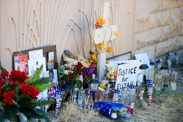 A memorial next to where Elijah McClain was forcibly restrained by Aurora police officers sits next to Billings Street in Aurora, Colorado. 