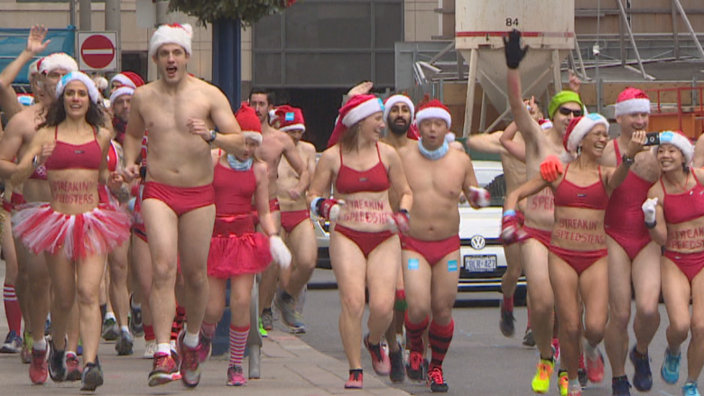 Cheeky Santas dash through Yorkville to raise funds for SickKids Hospital