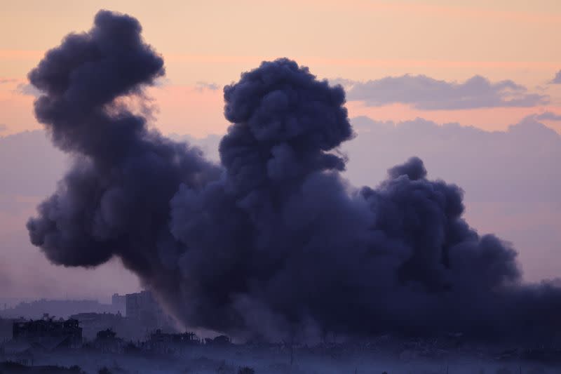 Smoke rises after Israeli air strikes in Gaza, as seen from southern Israel