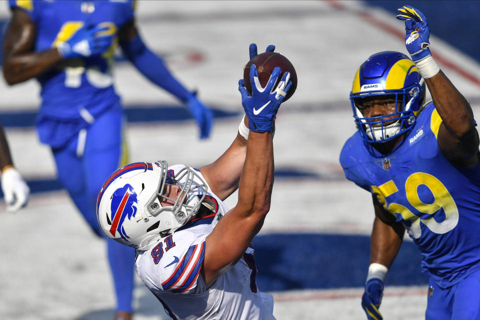 Buffalo Bills' Tyler Kroft (81) catches a pass for the game winning touchdown in front of Los Angeles Rams' Micah Kiser (59) during the second half of an NFL football game Sunday, Aug. 26, 2018, in Orchard Park, N.Y. The Bills won 35-32. (AP Photo/Adrian Kraus)