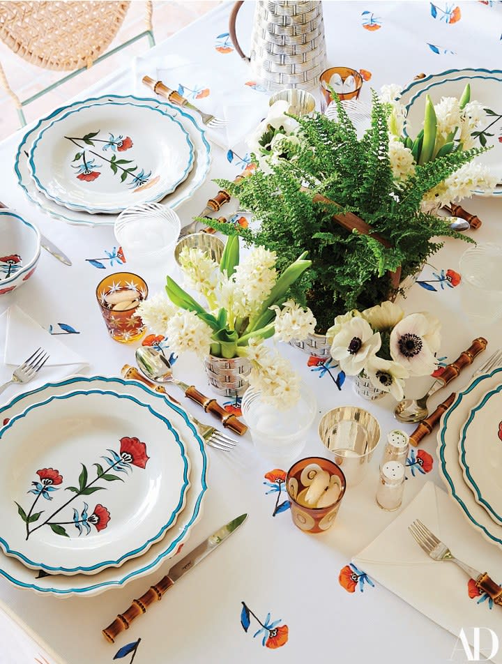 Table linens, plates, and glasses of de Ravenel's own design.