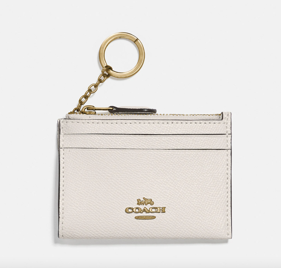 Coach Outlet Mini Skinny Id Case in Gold/Chalk (Photo via Coach Outlet)