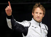 FILE PHOTO - Brawn GP Formula One driver Jenson Button of Britain waves after qualifying in pole position for the Spanish F1 Grand Prix at the Catalunya racetrack in Montmelo, near Barcelona, May 9, 2009. REUTERS/Dani Cardona/File Photo