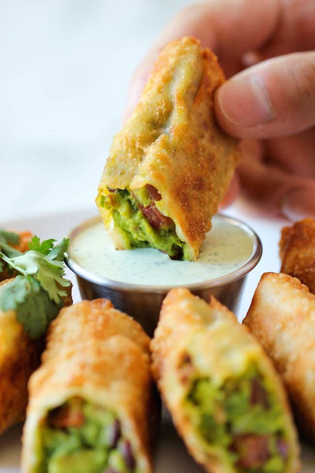 <strong>Get the <a href="http://damndelicious.net/2014/04/21/cheesecake-factory-avocado-egg-rolls/" target="_blank">Avocado Egg Rolls recipe</a> from Damn Delicious</strong>