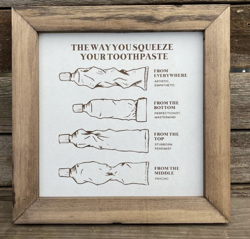 Framed illustration showing four ways people squeeze toothpaste tubes, with labels 