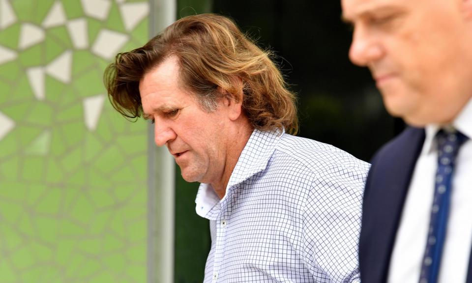 <span>Former Manly Warringah Sea Eagles coach Des Hasler departs Lidcombe Coroners Court after giving evidence into the death of Manly player Keith Titmuss in 2020.</span><span>Photograph: Bianca de Marchi/AAP</span>