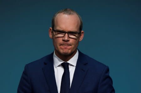 FILE PHOTO: Deputy Prime Minister (Tanaiste) Simon Coveney reacts during a press conference at Government buildings in Dublin, Ireland, December 4, 2017. REUTERS/Clodagh Kilcoyne