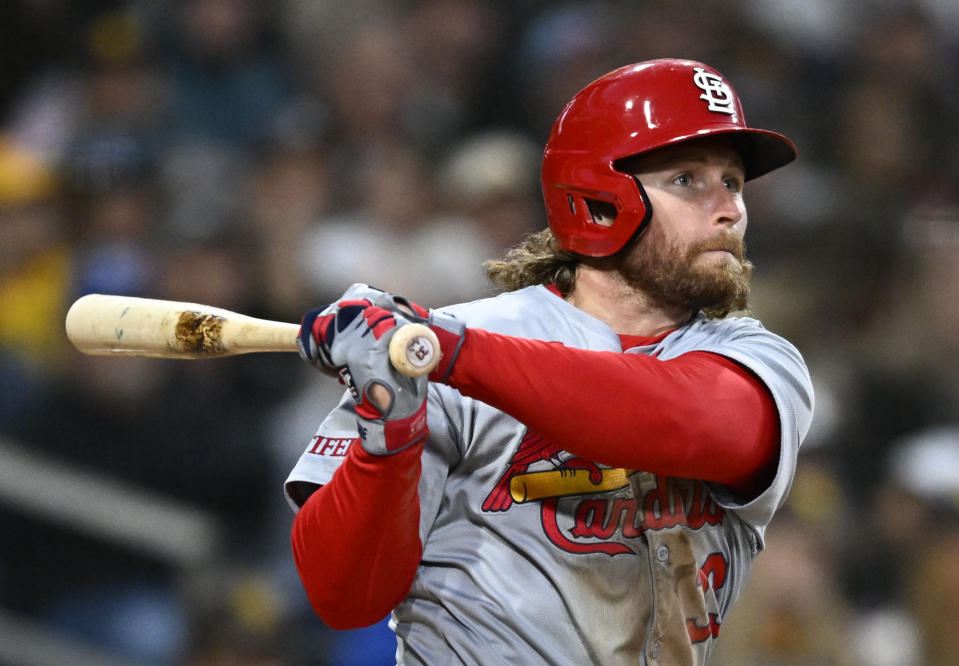 St. Louis Cardinals' Brendan Donovan (33) hits a double during the second inning of a baseball game against the San Diego Padres, Monday, April 1, 2024, in San Diego. (AP Photo/Denis Poroy)