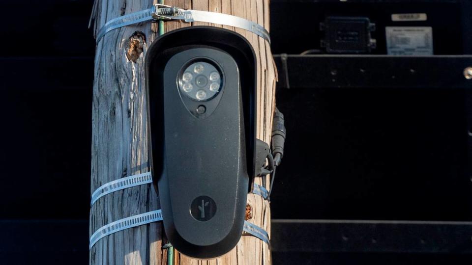 A Flock automated license plate reader camera, used by the Raleigh Police Department, was mounted on a Duke Energy utility pole on Hillsborough Street in Raleigh on Jan. 29.  RPD operates 26 automated readers that collect license plate and vehicle information, including color, make and type.  Travis Long/tlong@newsobserver.com