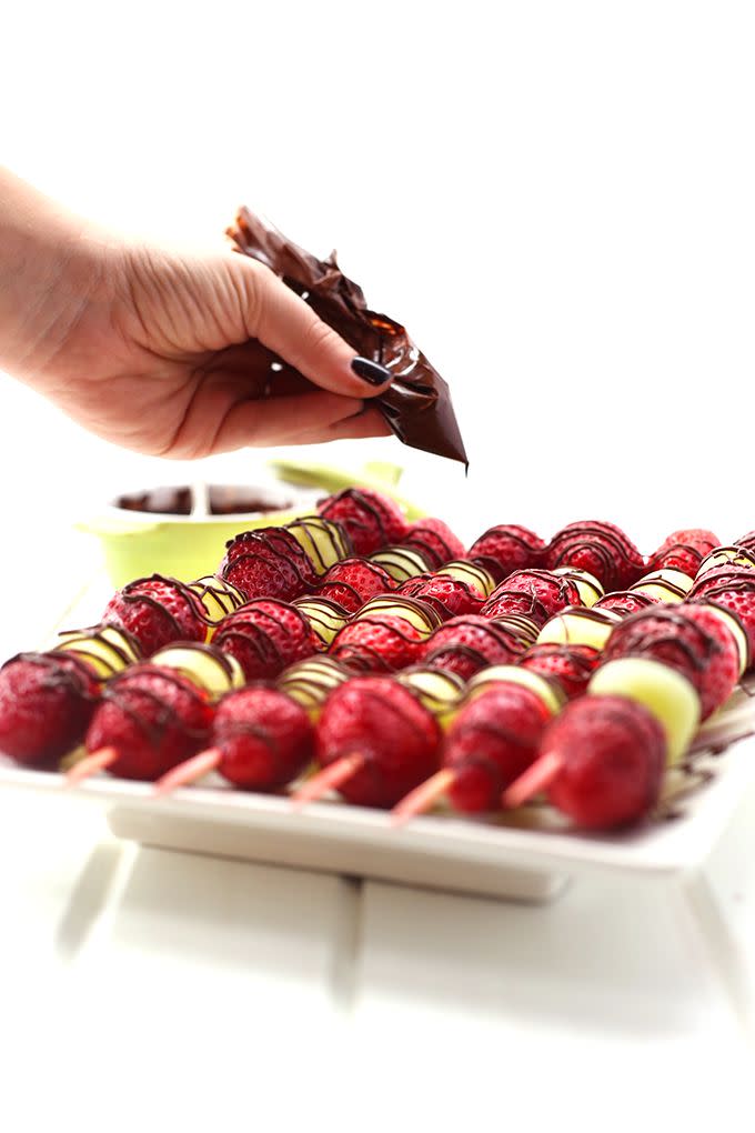 <strong>Get the <a href="http://www.thehealthymaven.com/2015/12/chocolate-drizzled-christmas-fruit.html" target="_blank">Chocolate-Drizzled Fruit Skewers recipe</a>&nbsp;from&nbsp;The Healthy Maven</strong>