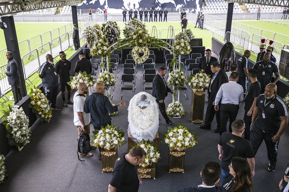 The coffin with the remains of Brazilian soccer great Pele lies on display on the pitch of the Vila Belmiro stadium in Santos, Brazil, Monday, Jan. 2, 2023. (AP Photo/Matias Delacroix)