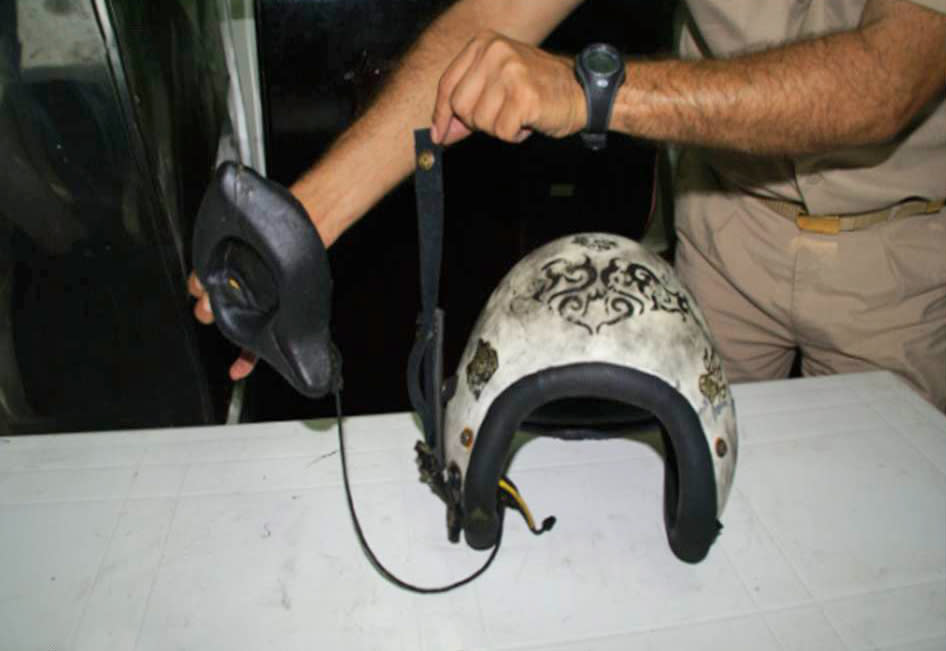 This photo taken Wednesday, July 4, 2012 and provided by the Turkish military, shows the helmet of one of the Turkish pilots of an RF-4 Phantom jet which was shot down by Syrian forces June 22, 2012. Turkey says the plane was hit in international airspace, but Syria insists it was flying low inside Syrian airspace. The bodies of two Turkish pilots were recovered from the seabed on Thursday July 5, 2012 after U.S. ocean explorer Robert Ballard, best known for discovering the wreck of the Titanic, helped locate them nearly two weeks after their jet was shot down by Syria. A Turkish official said Ballard, aboard his deep-sea exploration vessel R/V Nautilus, found the bodies Wednesday 8.6 nautical miles off the Syrian coast after the Turkish navy had pinpointed the area. (AP Photo/Turkish Military)