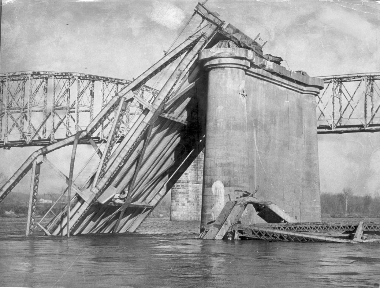 1967 - 'Silver Bridge' Tips Into Ohio River After Friday Disaster. Ohio Shore Is To Left 12/17/67