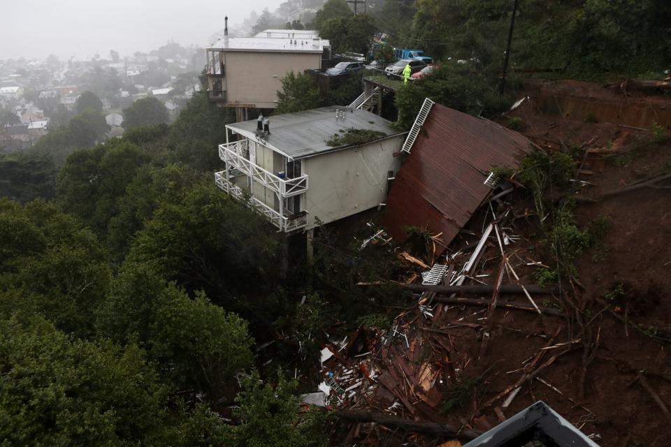 A home toppled by a mudslide caused by the horrific storm (Getty Images)