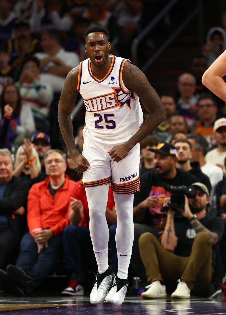 Phoenix Suns forward Nassir Little (25) celebrates a play against the Golden State Warriors in the first half at Footprint Center in Phoenix on Nov. 22, 2023. Mandatory Credit: Mark J. Rebilas-USA TODAY Sports