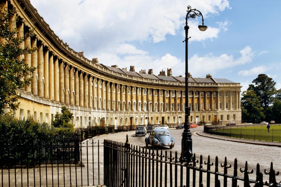 To see some of England’s most coveted addresses, take a promenade along Royal Crescent in Bath. The curved street features 30 Georgian terraced houses built in the late 18th century by architect John Wood, the Younger. The elegant residences are made of Bath stone and have been showcased in <em>Bridgerton, The Duchess</em>, and the BBC adaptation of Jane Austen’s <em>Persuasion</em>.