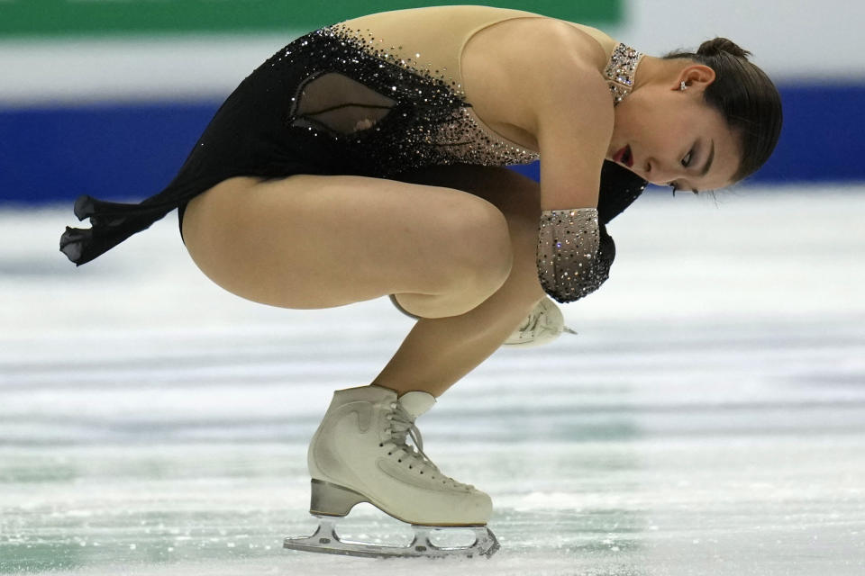 Japan's Kaori Sakamoto performs her Free Skating routine on her way to the gold medal in the Women's Final for the ISU Grand Prix of Figure Skating Final held in Beijing, Saturday, Dec. 9, 2023. (AP Photo/Ng Han Guan)