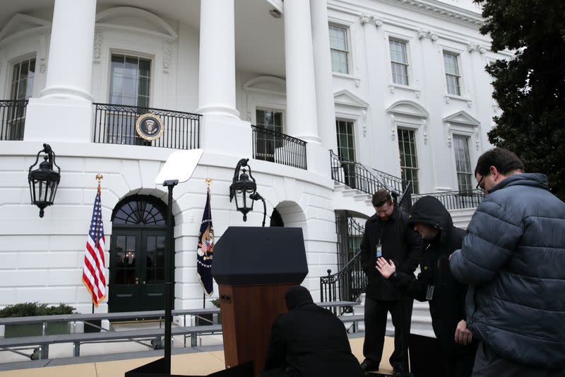 Workers prepare the South Lawn for a ceremony for U.S. President Trump to sign the United States-Mexico-Canada Agreement (USMCA) trade deal at the White House in Washington