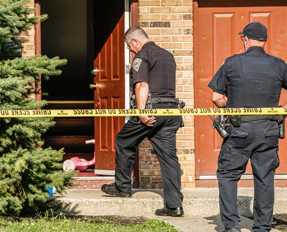 A child's tricycle sits just inside the door as Cumberland Police investigate after a 4-year-old child died Wednesday afternoon after being shot by another child in the home on Wednesday, July 5, 2023, in the 600 block of Woodlark Drive in Cumberland Ind.