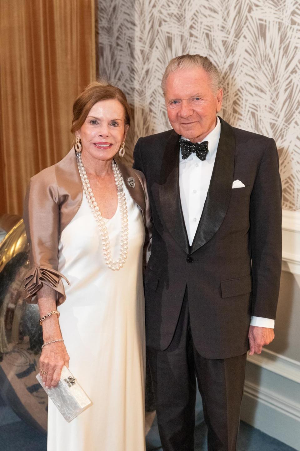 Lynne Wheat and Thomas Peterffy at the Cleveland Clinic annual Florida Ball on February 25, 2023 at The Breakers in Palm Beach.