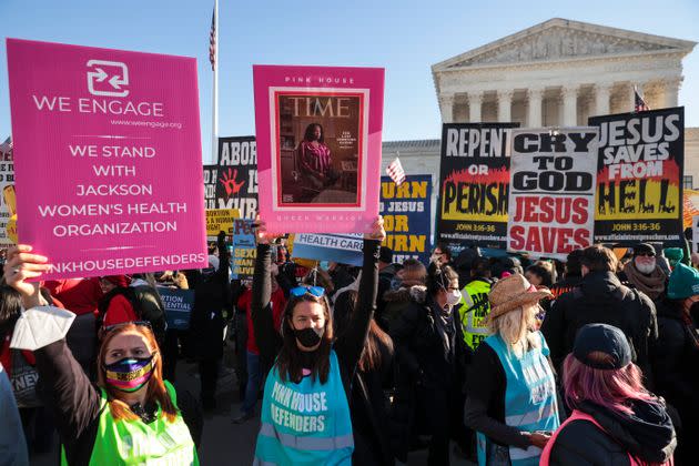 Demonstrators on both sides of the issue gather in front of the Supreme Court as the justices hear arguments Wednesday. (Photo: Chip Somodevilla via Getty Images)