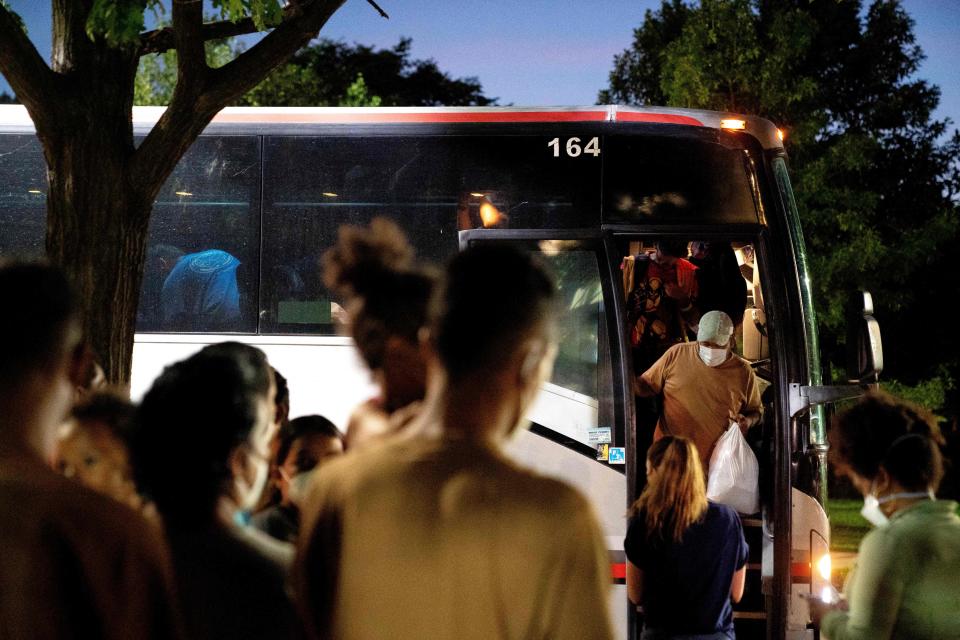 Migrants from Venezuela, who boarded a bus in Del Rio, Texas, disembark in Washington, D.C., on Aug. 2, 2022. / Credit: STEFANI REYNOLDS/AFP via Getty Images
