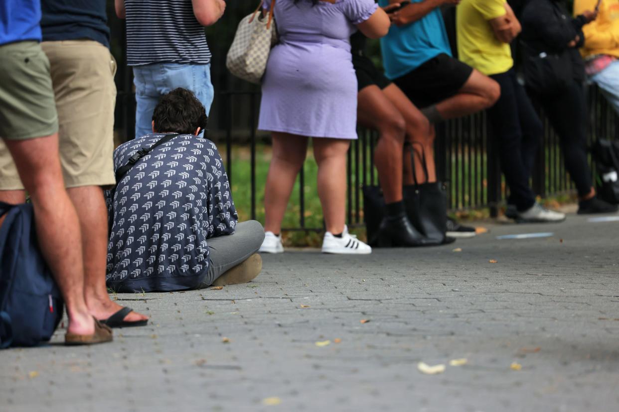 People wait in line to enter the Chelsea Sexual Health Clinic in Manhattan, New York on July 8, 2022.