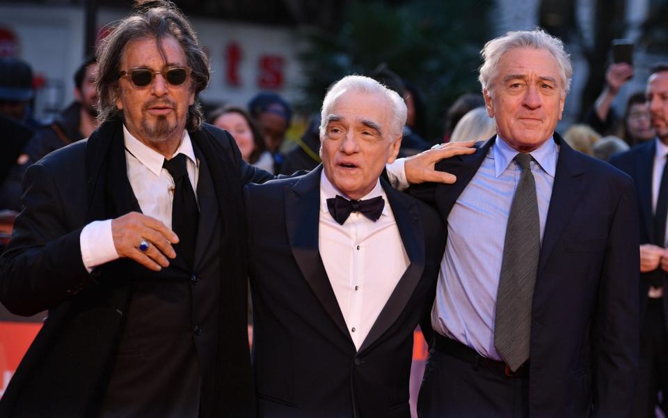 US actor Al Pacino, US filmmaker Martin Scorsese and US actor Robert De Niro pose on the red carpet as they arrive to attend the international premiere of the film "The Irishman" - AFP