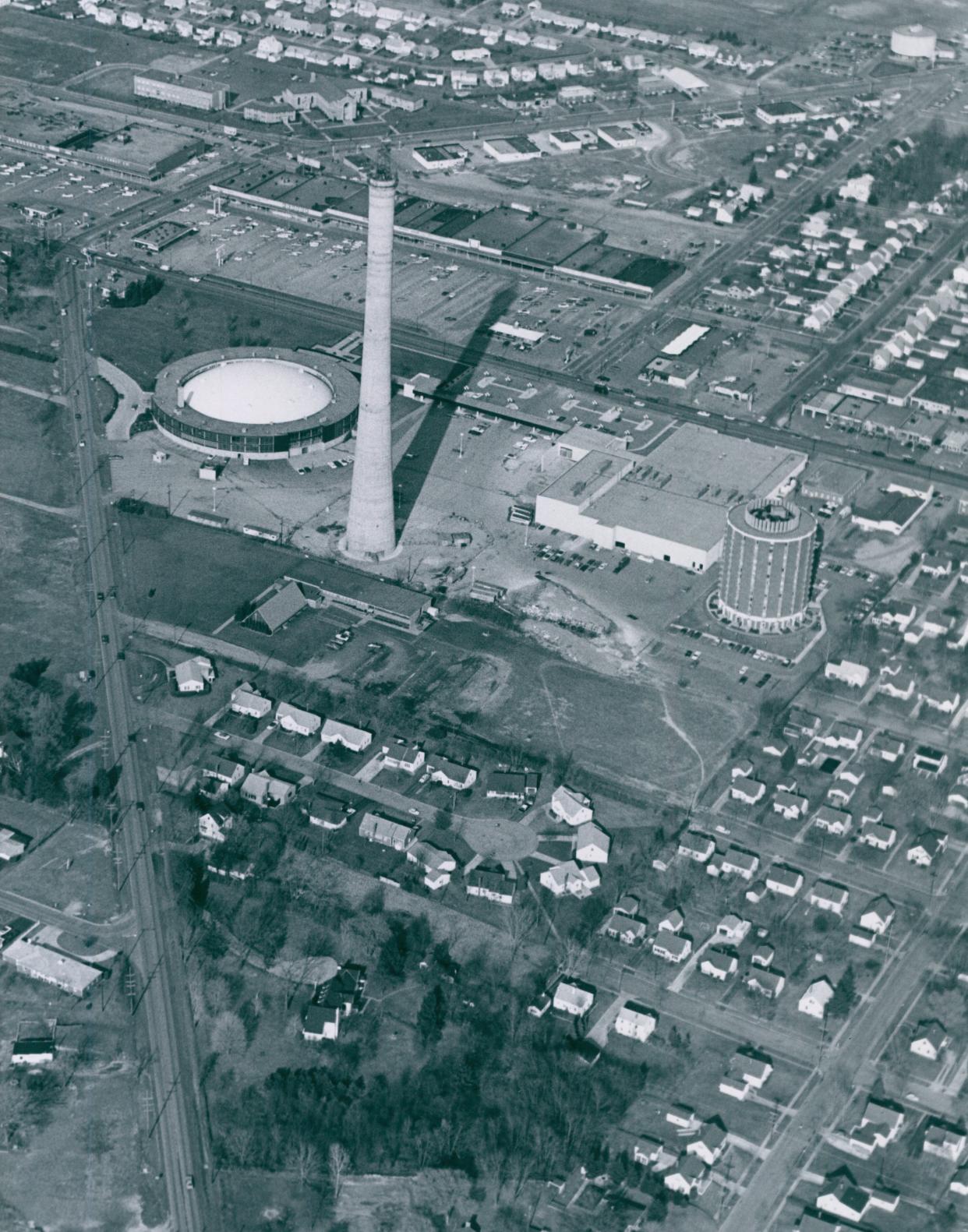 The unfinished Cathedral Tower is pictured in 1988 next to the Cathedral of Tomorrow in Cuyahoga Falls. The street to the left is Portage Trail Extension. State Road and State Road Shopping Center can be seen near the top of the image.