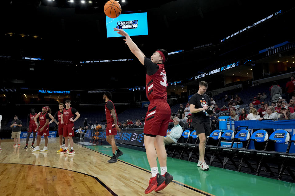 Nebraska guard Keisei Tominaga, foreground, practices for the team's first-round college basketball game in the NCAA Tournament, Thursday, March 21, 2024, in Memphis, Tenn. (AP Photo/George Walker IV)