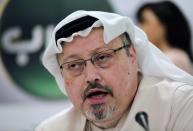 FILE - In this Feb. 1, 2015 file photo, Saudi journalist Jamal Khashoggi speaks during a news conference in Manama, Bahrain. Saudi Arabia is moving ahead with plans to hold a glitzy investment forum that kicks off Tuesday, Oct. 23, 2018, despite some of its most important speakers pulling out in the global outcry over the killing of Khashoggi. The meeting was intended to draw leading investors who could help underwrite Crown Prince Mohammed bin Salman’s ambitious plans to revamp the economy. (AP Photo/Hasan Jamali, File)