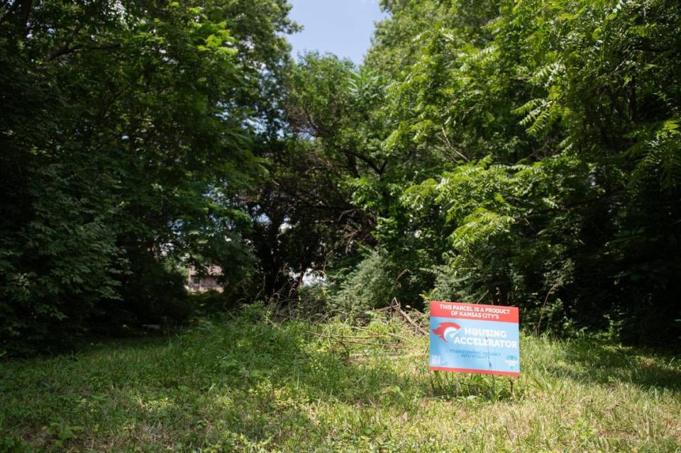 Signs announcing a city housing accelerator program to entice builders to erect houses on vacant lots have been placed along Agnes Avenue and blocks between 20th street and 19th street in Kansas City.