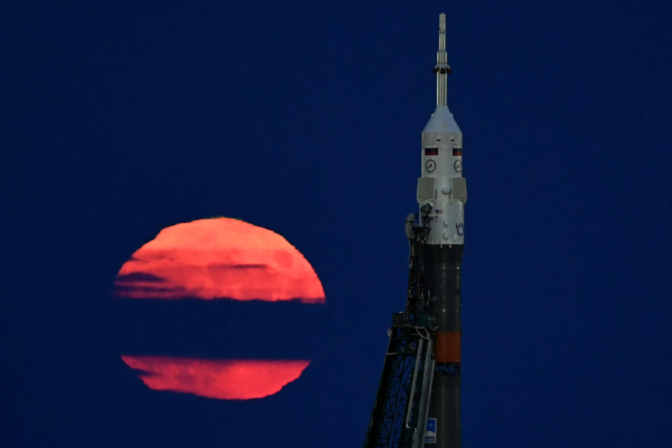 The supermoon is seen Monday behind the Soyuz MS-03 spacecraft set on the launch pad at the Russian-leased Baikonur cosmodrome in Kazakhstan.