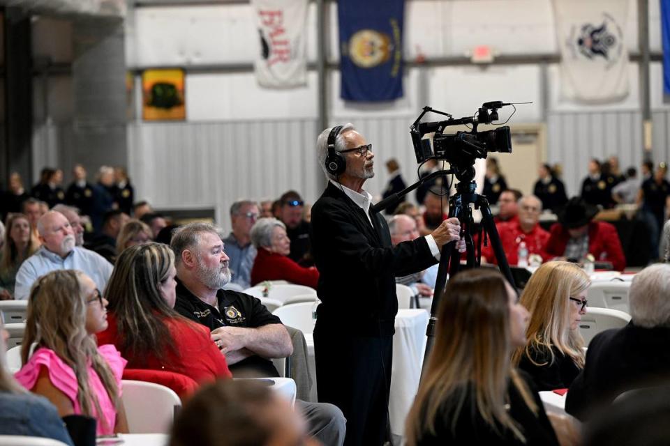 Charles Clapsaddle documents the action during the Manatee River Fair Association’s Distinguished Citizen award luncheon on Thursday, Jan. 4, 2024, in Veterans Hall at the Manatee County Fairgrounds.