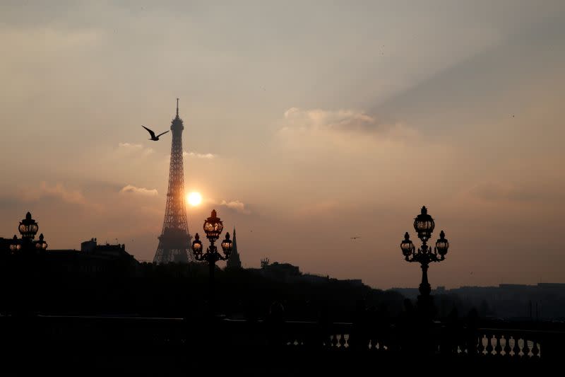 FILE PHOTO: The Eiffel tower is pictured as the sun sets on a winter day in Paris