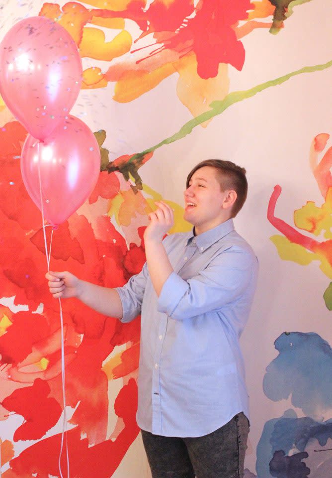 Adrian popped pink balloons to reveal blue confetti. Photo: Supplied/Facebook/HeatherLundbergGreen