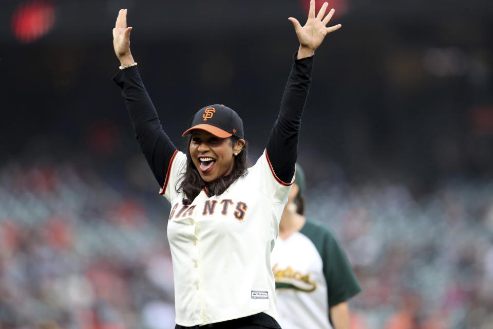 The mayor of San Francisco London Breed smiles after throwing out the first pitch before the San Francisco Giants and the Oakland Athletics baseball game in San Francisco, Friday, June 25, 2021. (AP Photo/Jed Jacobsohn)