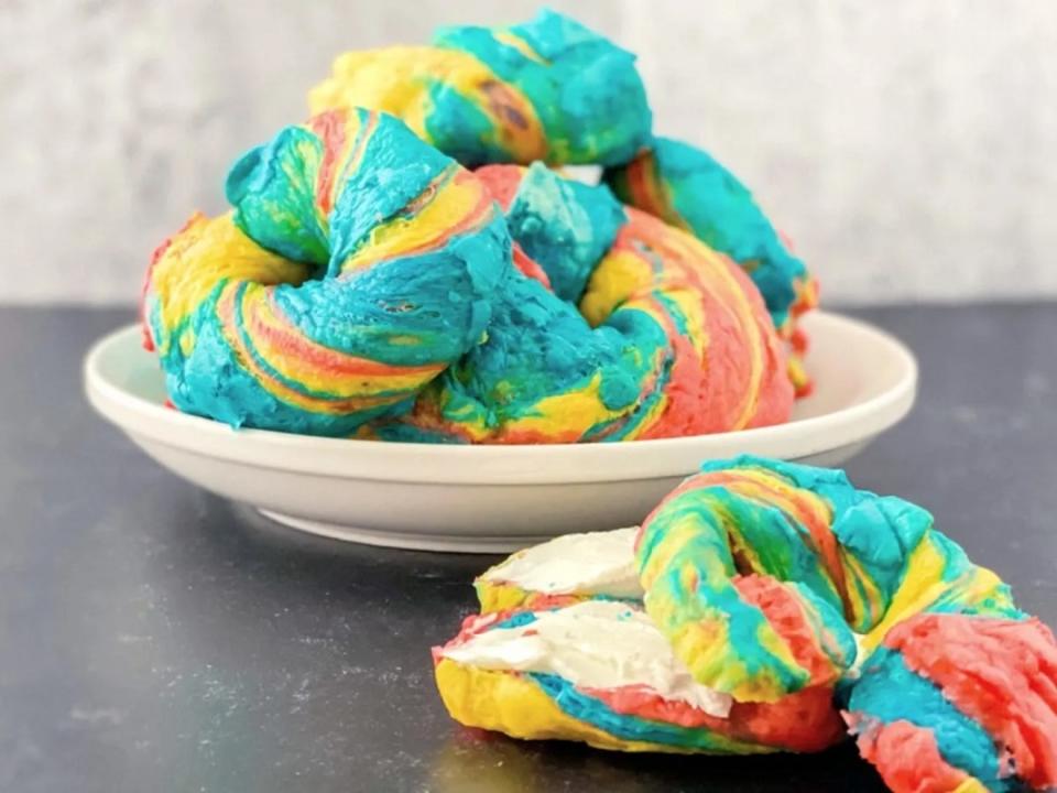 <p>Just is a Four Letter Word</p><p>Not just a rainbow, tie-dyed too!</p><p><strong>Get the recipe: <a href="https://justisafourletterword.com/rainbow-bagels/" rel="nofollow noopener" target="_blank" data-ylk="slk:Swirled Rainbow Bagels;elm:context_link;itc:0;sec:content-canvas" class="link ">Swirled Rainbow Bagels</a></strong></p>