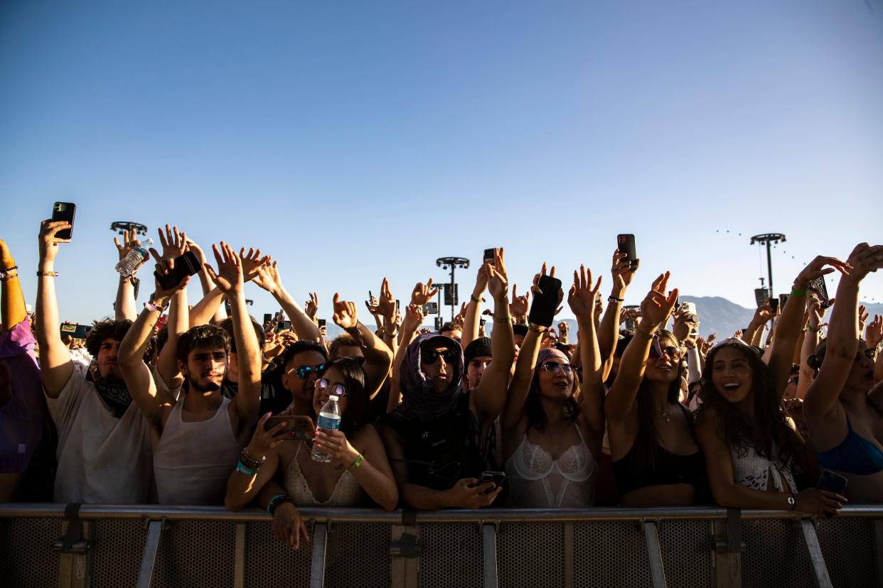 Festivalgoers cheer as Rae Sremmurd performs at the Outdoor theatre during the Coachella Valley Music and Arts Festival at the Empire Polo Club in Indio, Calif., Saturday, April 22, 2023. 