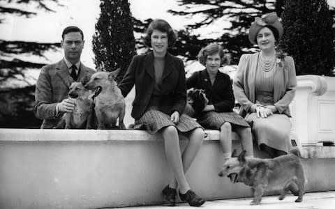 King George VI and Queen Elizabeth with their daughters Princess Elizabeth and Princess Margaret in the ground of the Royal Lodge - Credit:  Getty Creative