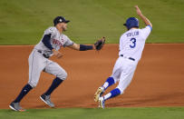 <p>Los Angeles Dodgers outfielder Chris Taylor (3) is tagged out by Houston Astros shortstop Carlos Correa (1) on a fielder’s choice in the fourth inning in game two of the 2017 World Series at Dodger Stadium. Mandatory Credit: Jayne Kamin-Oncea-USA TODAY Sports </p>