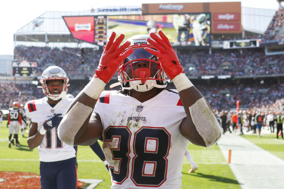 New England Patriots running back Rhamondre Stevenson (38) celebrates after a touchdown run of over 30 yards against the Cleveland Browns during the first half of an NFL football game, Sunday, Oct. 16, 2022, in Cleveland. (AP Photo/Ron Schwane)