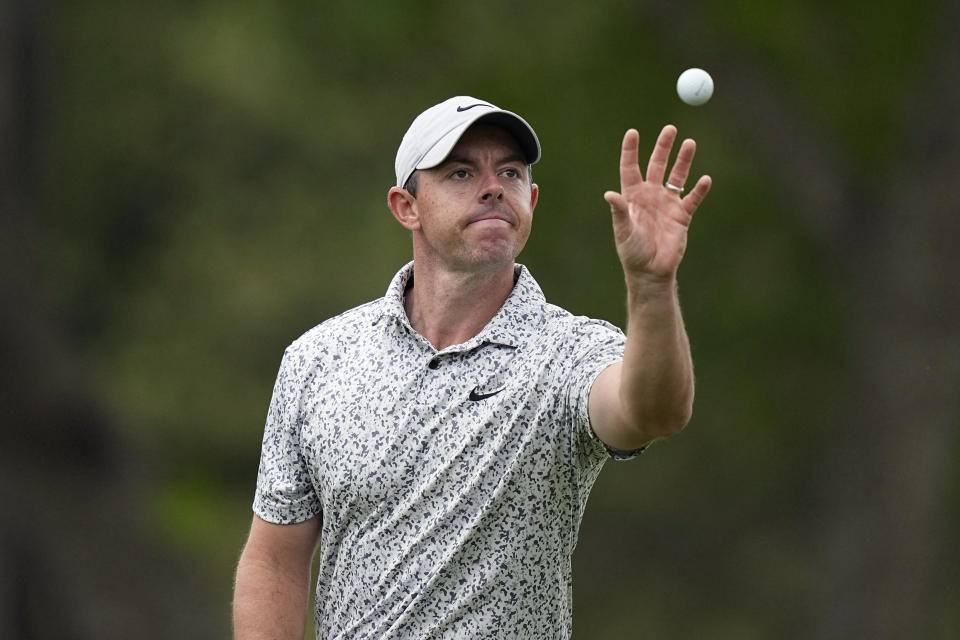 Rory McIlroy, of Northern Ireland, catches his ball on the fifth hole during the second round of the Dell Technologies Match Play Championship golf tournament in Austin, Texas, Thursday, March 23, 2023. (AP Photo/Eric Gay)