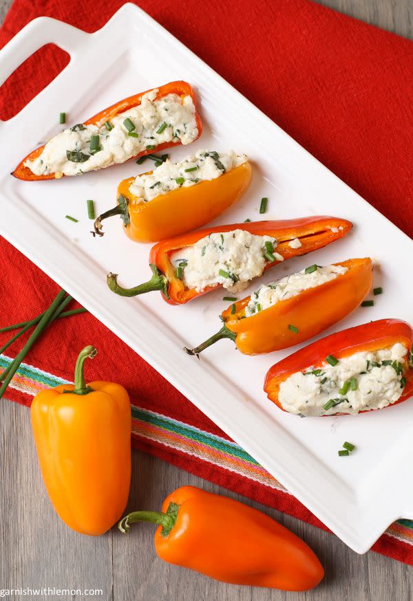 <p>Crisp and creamy = the super addictive side dish your summer is missing.</p><p>Get the recipe from <a href="http://www.garnishwithlemon.com/grilled-peppers-with-goat-cheese/#_a5y_p=1560336" rel="nofollow noopener" target="_blank" data-ylk="slk:Garnish with Lemon;elm:context_link;itc:0;sec:content-canvas" class="link ">Garnish with Lemon</a>.<br></p>