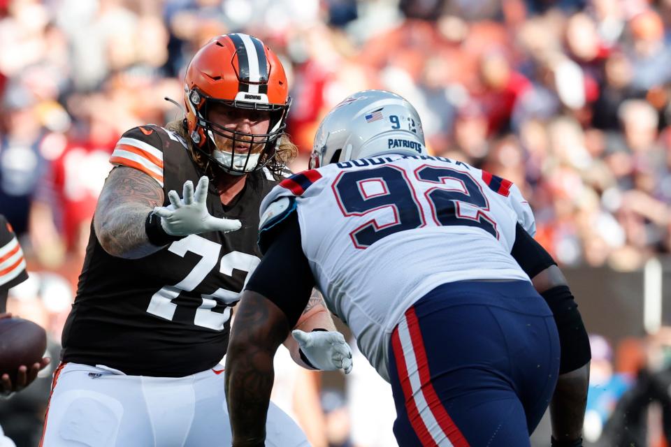 Cleveland Browns guard Hjalte Froholdt (72) blocks New England Patriots defensive tackle Davon Godchaux (92) during an NFL football game in Cleveland, Sunday, Oct. 16, 2022, (AP Photo/Rick Osentoski)