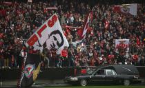 The hearse carrying Eusebio's coffin crosses the Luz stadium in Lisbon January 6, 2014.