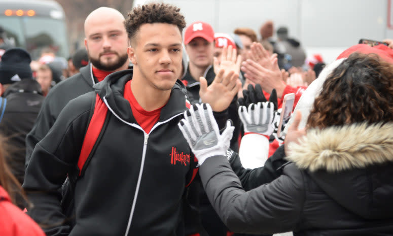 Adrian Martinez and the Nebraska Cornhuskers being greeted by fans.