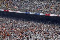 People sit in stands at Sardar Patel Stadium, where U.S. President Donald Trump addresses a "Namaste Trump" event with Indian Prime Minister Narendra Modi during his visit, in Ahmedabad