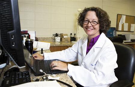 Dr. Pamela Banister poses while working at a clinic which is part of the Singing River Health System in Pascagoula, Mississippi September 26, 2013. REUTERS/Lyle Ratliff